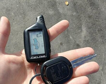 Черный Шевроле Нубира, объемом двигателя 1.99 л и пробегом 237 тыс. км за 6500 $, фото 10 на Automoto.ua