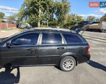 Черный Шевроле Нубира, объемом двигателя 1.99 л и пробегом 237 тыс. км за 6500 $, фото 31 на Automoto.ua