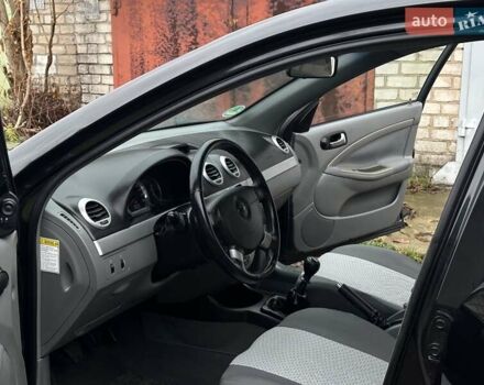 Черный Шевроле Нубира, объемом двигателя 1.6 л и пробегом 205 тыс. км за 5450 $, фото 37 на Automoto.ua