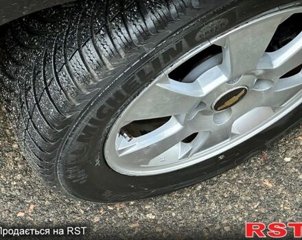 Черный Шевроле Нубира, объемом двигателя 1.6 л и пробегом 205 тыс. км за 5450 $, фото 13 на Automoto.ua