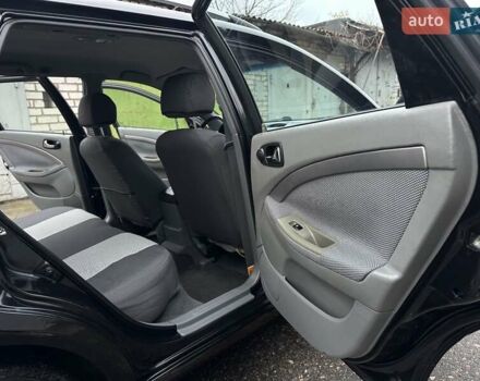 Черный Шевроле Нубира, объемом двигателя 1.6 л и пробегом 205 тыс. км за 5550 $, фото 37 на Automoto.ua