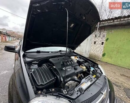 Черный Шевроле Нубира, объемом двигателя 1.6 л и пробегом 205 тыс. км за 5550 $, фото 43 на Automoto.ua