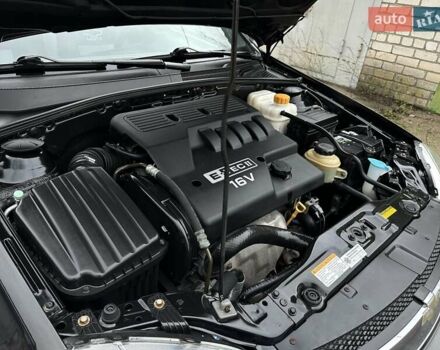 Черный Шевроле Нубира, объемом двигателя 1.6 л и пробегом 205 тыс. км за 5450 $, фото 43 на Automoto.ua