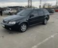 Черный Шевроле Нубира, объемом двигателя 1.6 л и пробегом 209 тыс. км за 5500 $, фото 1 на Automoto.ua