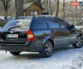 Черный Шевроле Нубира, объемом двигателя 1.6 л и пробегом 230 тыс. км за 4950 $, фото 68 на Automoto.ua