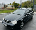 Черный Шевроле Нубира, объемом двигателя 1.6 л и пробегом 252 тыс. км за 4500 $, фото 1 на Automoto.ua