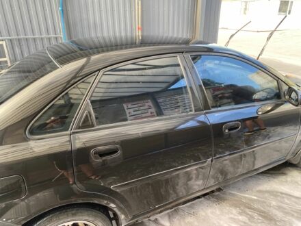 Черный Шевроле Нубира, объемом двигателя 1.8 л и пробегом 136 тыс. км за 2300 $, фото 1 на Automoto.ua