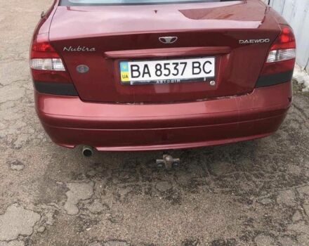 Красный Шевроле Нубира, объемом двигателя 2 л и пробегом 200 тыс. км за 3000 $, фото 2 на Automoto.ua
