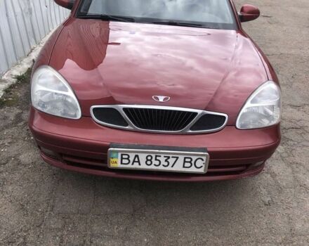 Красный Шевроле Нубира, объемом двигателя 2 л и пробегом 200 тыс. км за 3000 $, фото 1 на Automoto.ua