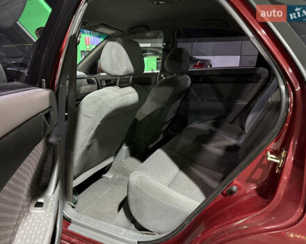 Красный Шевроле Нубира, объемом двигателя 1.8 л и пробегом 115 тыс. км за 3450 $, фото 18 на Automoto.ua