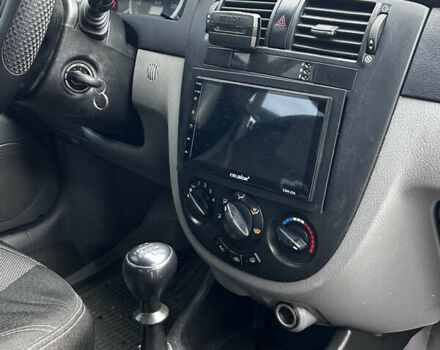 Красный Шевроле Нубира, объемом двигателя 1.6 л и пробегом 222 тыс. км за 3999 $, фото 12 на Automoto.ua