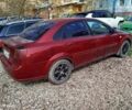 Красный Шевроле Нубира, объемом двигателя 1.8 л и пробегом 430 тыс. км за 3200 $, фото 1 на Automoto.ua