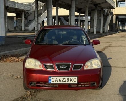 Красный Шевроле Нубира, объемом двигателя 1.8 л и пробегом 231 тыс. км за 3500 $, фото 1 на Automoto.ua