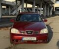 Красный Шевроле Нубира, объемом двигателя 1.8 л и пробегом 231 тыс. км за 3500 $, фото 1 на Automoto.ua