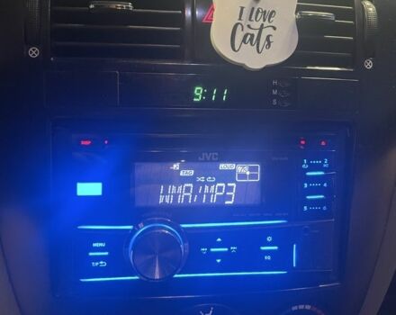 Красный Шевроле Нубира, объемом двигателя 1.8 л и пробегом 250 тыс. км за 3099 $, фото 10 на Automoto.ua