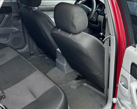 Красный Шевроле Нубира, объемом двигателя 1.6 л и пробегом 222 тыс. км за 3999 $, фото 13 на Automoto.ua