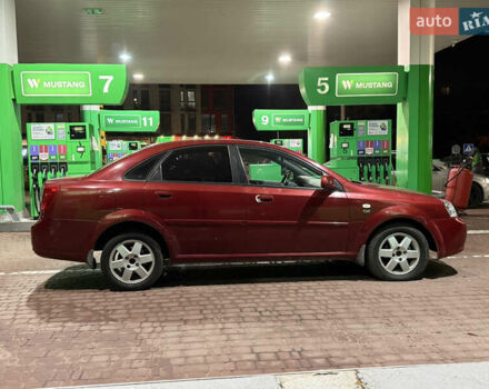 Красный Шевроле Нубира, объемом двигателя 1.8 л и пробегом 115 тыс. км за 3450 $, фото 8 на Automoto.ua