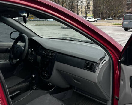 Красный Шевроле Нубира, объемом двигателя 1.6 л и пробегом 222 тыс. км за 3999 $, фото 11 на Automoto.ua