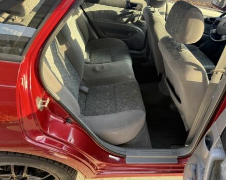 Красный Шевроле Нубира, объемом двигателя 1.8 л и пробегом 231 тыс. км за 3500 $, фото 18 на Automoto.ua