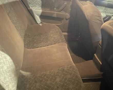 Красный Шевроле Нубира, объемом двигателя 1.8 л и пробегом 250 тыс. км за 3099 $, фото 12 на Automoto.ua