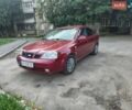 Красный Шевроле Нубира, объемом двигателя 1.8 л и пробегом 300 тыс. км за 3500 $, фото 1 на Automoto.ua