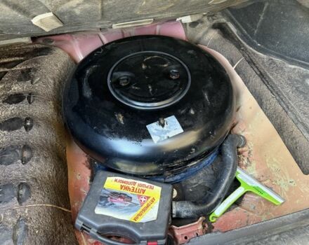 Красный Шевроле Нубира, объемом двигателя 1.8 л и пробегом 231 тыс. км за 3500 $, фото 22 на Automoto.ua