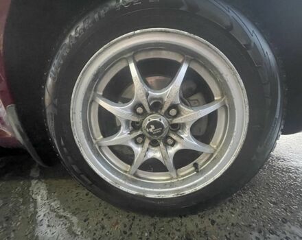 Красный Шевроле Нубира, объемом двигателя 1.8 л и пробегом 250 тыс. км за 3099 $, фото 4 на Automoto.ua