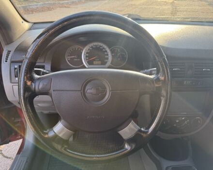 Красный Шевроле Нубира, объемом двигателя 1.8 л и пробегом 231 тыс. км за 3500 $, фото 14 на Automoto.ua