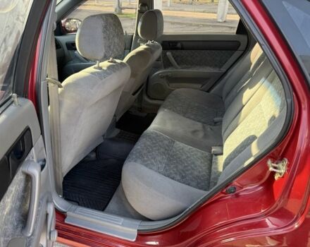 Красный Шевроле Нубира, объемом двигателя 1.8 л и пробегом 231 тыс. км за 3500 $, фото 20 на Automoto.ua