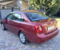 Красный Шевроле Нубира, объемом двигателя 1.8 л и пробегом 78 тыс. км за 4450 $, фото 3 на Automoto.ua
