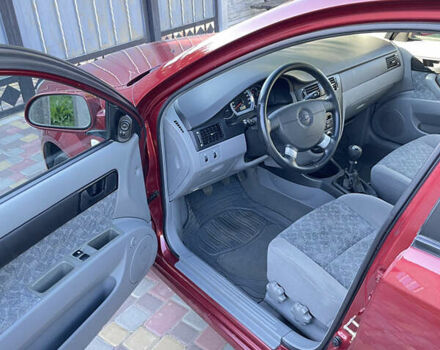 Красный Шевроле Нубира, объемом двигателя 1.8 л и пробегом 78 тыс. км за 4450 $, фото 7 на Automoto.ua