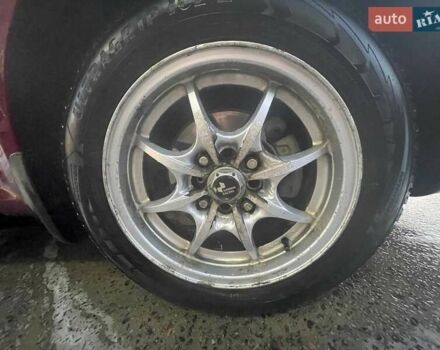 Красный Шевроле Нубира, объемом двигателя 1.8 л и пробегом 250 тыс. км за 3800 $, фото 12 на Automoto.ua