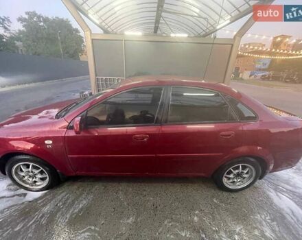 Красный Шевроле Нубира, объемом двигателя 1.8 л и пробегом 250 тыс. км за 3800 $, фото 2 на Automoto.ua