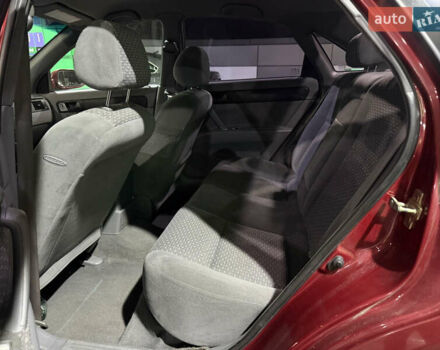 Красный Шевроле Нубира, объемом двигателя 1.8 л и пробегом 115 тыс. км за 3450 $, фото 19 на Automoto.ua