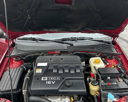 Красный Шевроле Нубира, объемом двигателя 1.6 л и пробегом 222 тыс. км за 3999 $, фото 14 на Automoto.ua