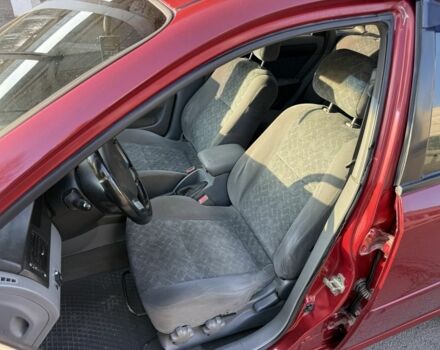 Красный Шевроле Нубира, объемом двигателя 1.8 л и пробегом 231 тыс. км за 3500 $, фото 12 на Automoto.ua