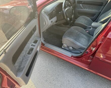 Красный Шевроле Нубира, объемом двигателя 1.8 л и пробегом 231 тыс. км за 3500 $, фото 10 на Automoto.ua