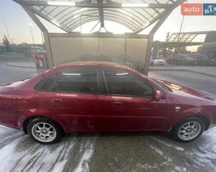 Красный Шевроле Нубира, объемом двигателя 1.8 л и пробегом 250 тыс. км за 3800 $, фото 5 на Automoto.ua