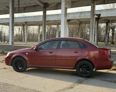 Красный Шевроле Нубира, объемом двигателя 1.8 л и пробегом 231 тыс. км за 3500 $, фото 7 на Automoto.ua