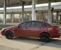 Красный Шевроле Нубира, объемом двигателя 1.8 л и пробегом 231 тыс. км за 3500 $, фото 7 на Automoto.ua