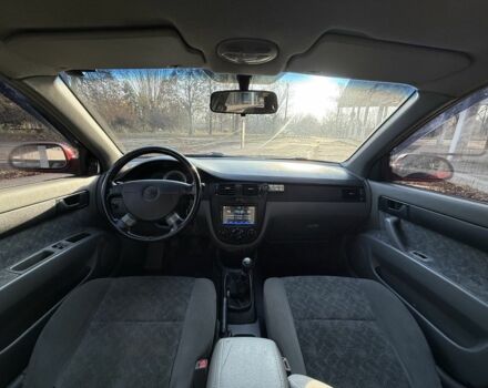 Красный Шевроле Нубира, объемом двигателя 1.8 л и пробегом 231 тыс. км за 3500 $, фото 19 на Automoto.ua