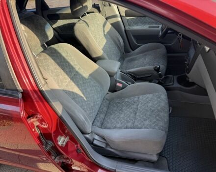 Красный Шевроле Нубира, объемом двигателя 1.8 л и пробегом 231 тыс. км за 3500 $, фото 17 на Automoto.ua