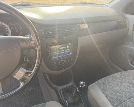 Красный Шевроле Нубира, объемом двигателя 1.8 л и пробегом 231 тыс. км за 3500 $, фото 16 на Automoto.ua