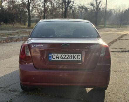 Красный Шевроле Нубира, объемом двигателя 1.8 л и пробегом 231 тыс. км за 3500 $, фото 5 на Automoto.ua