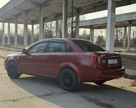 Красный Шевроле Нубира, объемом двигателя 1.8 л и пробегом 231 тыс. км за 3500 $, фото 6 на Automoto.ua