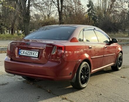 Красный Шевроле Нубира, объемом двигателя 1.8 л и пробегом 231 тыс. км за 3500 $, фото 4 на Automoto.ua
