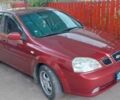 Красный Шевроле Нубира, объемом двигателя 1.8 л и пробегом 330 тыс. км за 3600 $, фото 1 на Automoto.ua