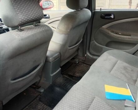 Красный Шевроле Нубира, объемом двигателя 1.8 л и пробегом 206 тыс. км за 3000 $, фото 3 на Automoto.ua