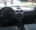 Красный Шевроле Нубира, объемом двигателя 1.6 л и пробегом 249 тыс. км за 3750 $, фото 3 на Automoto.ua