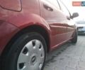 Красный Шевроле Нубира, объемом двигателя 1.6 л и пробегом 249 тыс. км за 3750 $, фото 18 на Automoto.ua